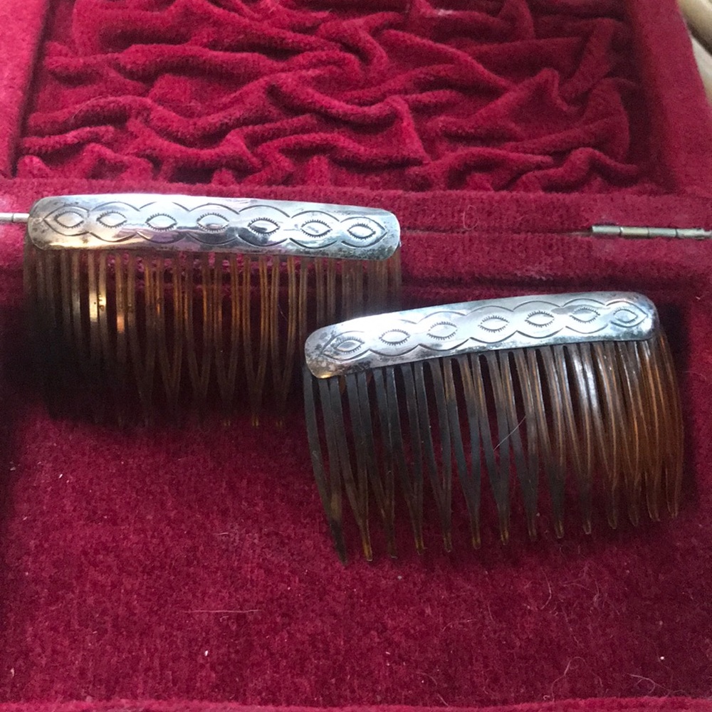 One pair of Native American sterling silver combs.